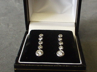 A pair of lady's 5 stone diamond drop earrings (approx 1.32ct)