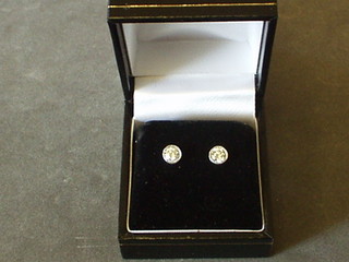 A pair of lady's diamond set ear studs (approx 0.82ct)