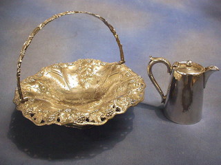 A silver plated hotelware hotwater jug and a Britannia metal embossed fruit bowl with swing handle