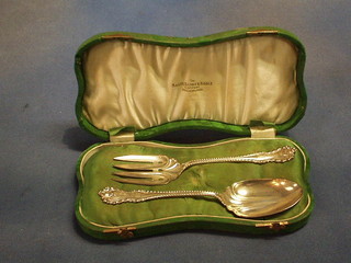 A pair of Sterling serving spoons