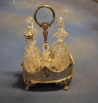 A silver plated bottle cruet with 6 bottles