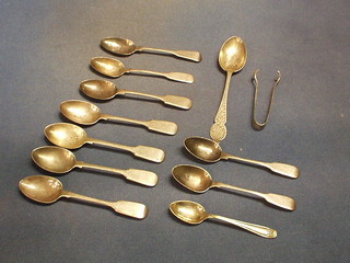 A set of fiddle pattern silver tea spoons, an engraved silver spoon, pair of tongs and 1 other spoon, 8 ozs 