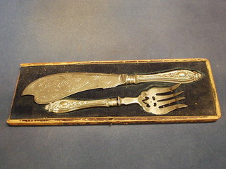 A pair of silver plated fish servers and a quantity of silver plated flatware