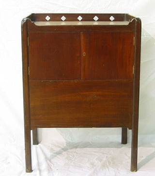 An unusual rectangular Georgian mahogany tray top commode with cupboard and commode drawer to the side, raised on square tapering supports, 22"