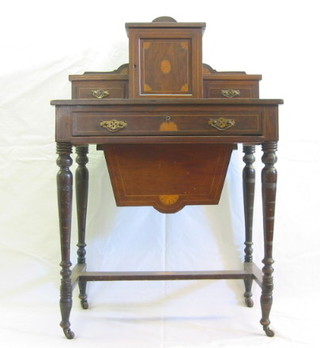 A Victorian inlaid rosewood work table with raised back fitted a cupboard flanked by a pair of drawers, the top with inset tooled leather writing surface, the base fitted 1 long drawer above a deep basket, raised on turned supports with H framed stretcher