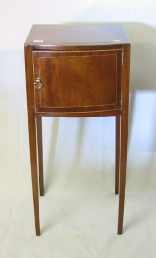 A 19th Century mahogany bow front pot cupboard, with crossbanded inlaid top, raised on square supports, 14"