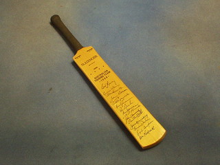 A 1968 miniature cricket bat with facsimile signatures of 1968 Australian touring side