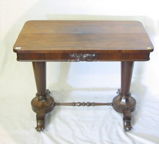 A William IV rosewood rectangular centre table, raised on chamfered columns united by a turned H framed stretcher