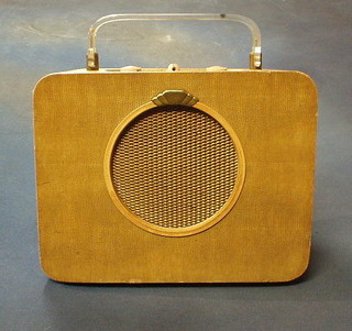 An Ever Ready Sky Queen radio contained in a green fibre case