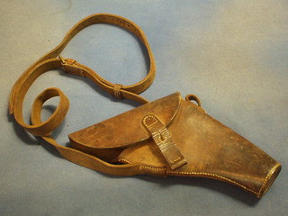 A leather holster marked J.L.F & Co, 1941