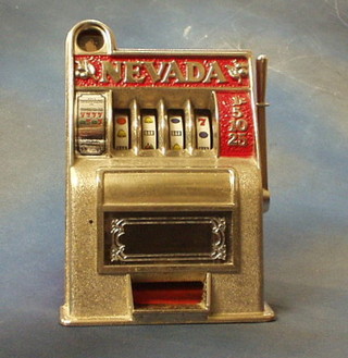 A Nevada miniature 1 armed bandit, 7 1/2" (f)