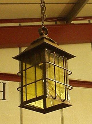 A 19th/20th Century iron hanging lantern 21"