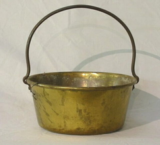 A circular copper preserving pan with iron handle 13"