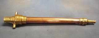A 19th Century copper and brass fire hose nozzle 21" 
