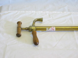A 19th Century brass hand pump