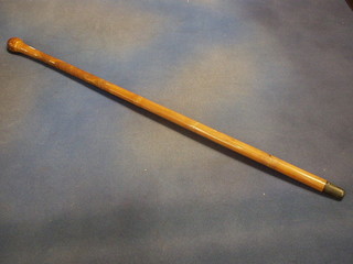 An Oriental carved bamboo walking stick