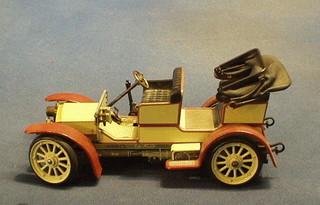 A Schuco clock work model of a 1902 Mercedes Benz 1229