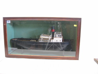 A wooden model of a tug, 27", cased