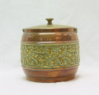 A circular copper and brass biscuit barrel, a copper glove box, a brass cigarette box and a metal tobacco box