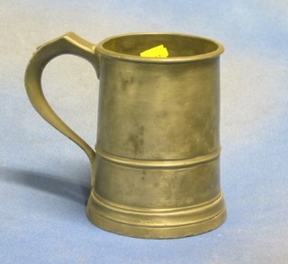 A Victorian pewter quart tankard and a Victorian pewter half pint beaker