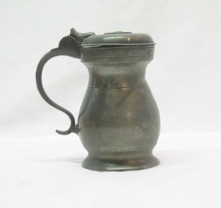 A  Georgian 51 gals lidded tankard, the top marked Imperial Standards