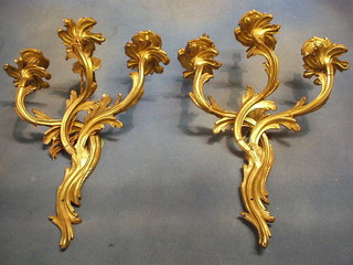 A pair of gilt Ormolu 3 light wall brackets