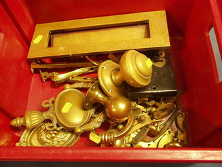 A collection of various brass door knockers etc