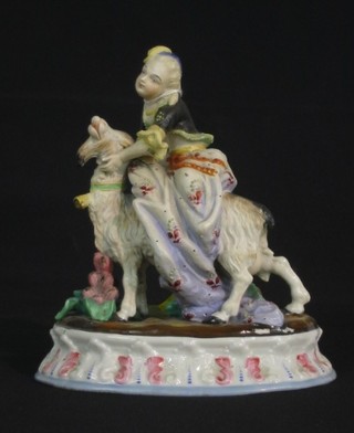 A 19th Century Continental biscuit porcelain figure group of a girl on a goat 9"