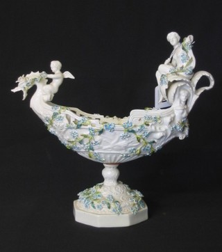 A 19th Century Continental porcelain boat shaped table centre piece, 11" (f and r)