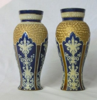 A pair of Royal Doulton salt glazed vases, the base impressed 1690 NN, 12"