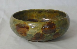 A circular Royal Doulton bowl decorated Autumn leaves, the base marked Royal Doulton 63229 10"