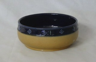A circular Royal Doulton salt glazed bowl, impressed 7342, 7"