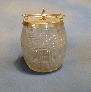 A cut glass biscuit barrel with silver plated top