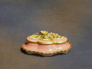 A 19th Century puce coloured porcelain 3 bottle inkwell with gilt banding and floral encrustation 7"