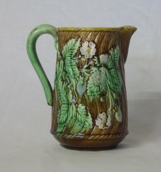 A 19th Century Majolica jug decorated leaves 6"