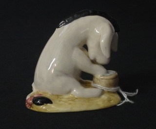 A Royal Doulton figure from the Winnie the Pooh Collection "Eeyore's Birthday" WP14