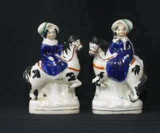 A pair of 19th Century Staffordshire figures of a lady's riding horses side saddle 6" (one with firing fault)