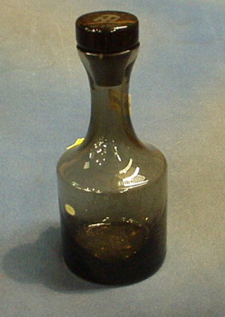 An etched brown glass decanter by Hafen Hamburg