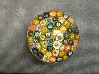 A Millefiouri glass paperweight 2"