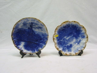 A pair of Flo Bleu pottery plates decorated windmills 8"