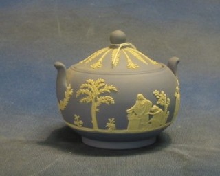 A circular twin handled Wedgwood blue jasperware urn and cover, base marked 30 3"