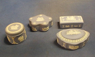 A Wedgwood rectangular trinket box 3 1/2", a shaped trinket box 4", an oval trinket box 4 1/2" and a circular trinket box 3" (4)