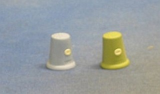 2 Wedgwood green and blue Jasperware thimbles, a table lighter, a compact and a flan knife