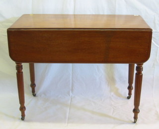 A 19th Century mahogany Pembroke table fitted a drawer, raised on turned and reeded supports 36"