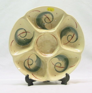 A Susie Cooper circular hors d'eouvres dish marked Crown Works Burslem, 11"