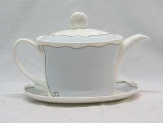 A Royal Doulton teapot and stand (second)