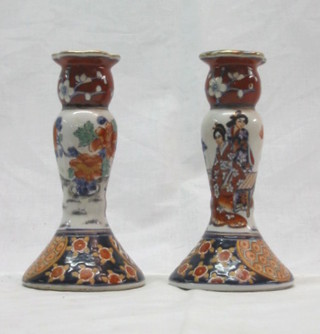 A pair of Oriental candlesticks decorated polychrome enamels 6"