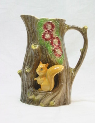 A Royal Hornsea pottery jug decorated a tree with squirrel 7"