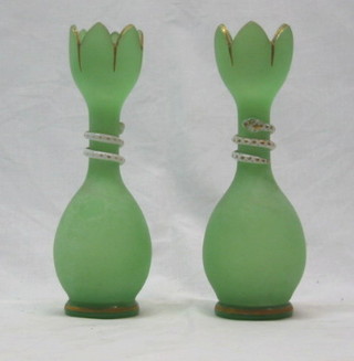 A pair of Victorian opaque glass vases decorated servants 10"