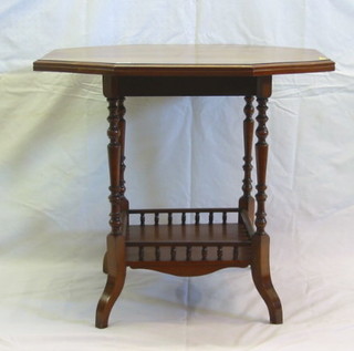 An Edwardian octagonal walnutwood occasional table raised on turned supports with undertier and bobbin turned gallery 30"